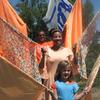 Our dear friend Dr. Franca from Maryland with what was believed to be a one of a kind pair of  wing flags. The Lord led us to bless her with them. Months later as Julie was going through fabric she found the butterfly fabric at the bottom of our pile & it was enough to make another pair. Praise God!